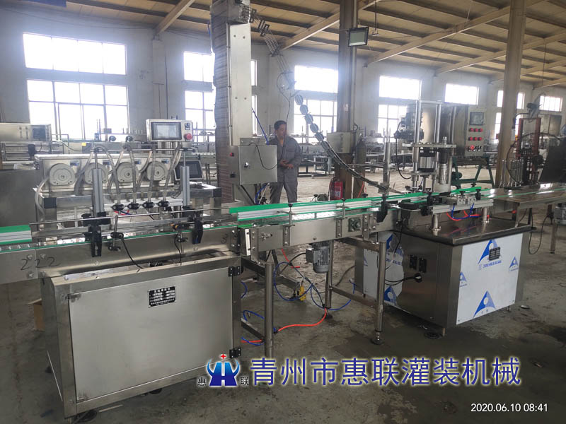 全自動(dòng)奶茶灌裝封口機(jī) 全自動(dòng)奶茶灌裝封口機(jī)